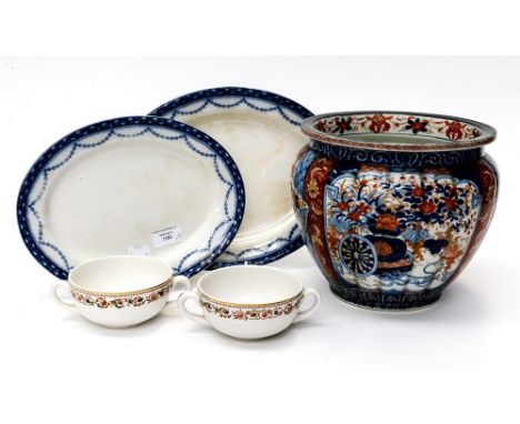 A late 19th century Japanese Imari jardiniere circa 1880, together with two Edwardian meat plates and two soup bowls (5)