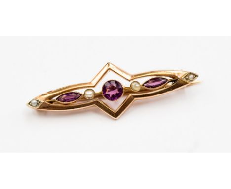 A 9ct rose gold amethyst and seed pearl Edwardian brooch, length approx 4cm with a total weight of approx 2.4gms