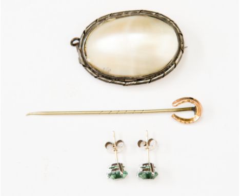 A pair of 14ct white gold stud earrings approx 1.3gms, a silver shell brooch, and a 9ct gold horse shoe stick pin