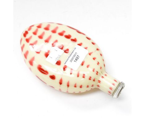 A Victorian Nailsea glass style flask with stopper, having cream ground with red spots