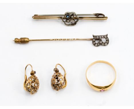 Four items of gold jewellery comprising a diamond set B stick pin, a gypsy style signet, a bar brooch and a pair of white sto