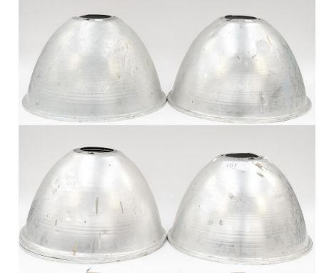A set of four stylish 1950s aluminium lamp shades, 55cm in diameter, unmarked