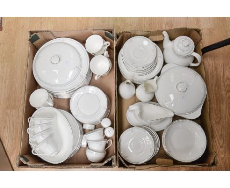 An extensive Royal Doulton Carnation tea and dinner service including 12 cups and saucers, various bowls, plates, tureens, et