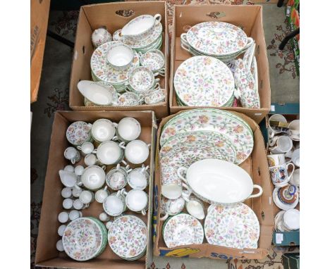 A Minton 'Haddon Hall' full dinner service, including twelve saucers, thirteen plates, twelve soup bowls, twelve tea cups, cr