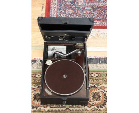 A 1940/50s picnic carry record player in black vinyl case 