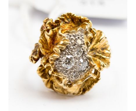 A diamond, eighteen carat yellow gold, 1970s statement cluster ring, set with five old European cut diamonds, approx total di