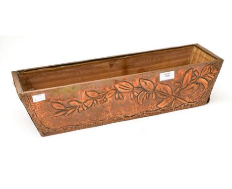 An Art Nouveau copper clad planter