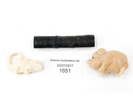 A Japanese Pig netsuke, signed, a carved ivory Chameleon and a Japanese chopstick rest (3) 