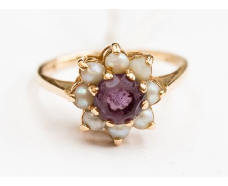 A 14ct gold, pearl and amethyst flower head cluster ring, size L1/2 with a total gross weight approx 3.1gms (af)