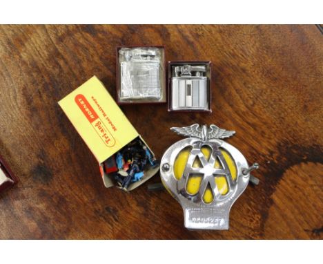 A collection of approx thirty Triang Model Railway figures in a box, AA Car bumper badge in chrome and enamel and two Ronson 