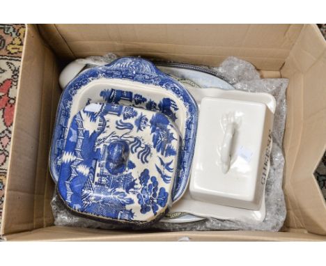 A collection of ceramics comprising blue and white tureen meat plate, two further meat plates, a ladle and a cheese dish and 