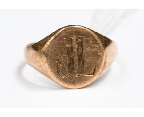 A 9ct rose gold gentleman's signet ring engraved with initials J L, size V with a weight approx 3.4gms