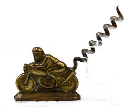 A gilt painted novelty corkscrew, in the form of a motor cyclist on a motorbike, with a corkscrew emerging from the exhaust p