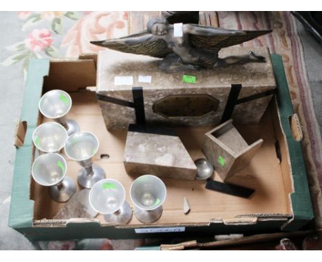 An Art Deco marble garniture clock set with surmounted winged female figure, with two end sections, complete with a collectio