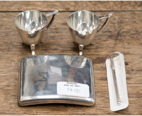 A pair of  Edward VII tot cups, ovoid shape plain bodies with stylised handle, Lee and Wigfull  Sheffield 1908 2.04 oz approx