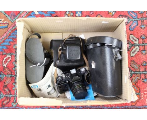 Two cased pairs of binoculars and a Zenith 3E HNT camera in casing and with instructions