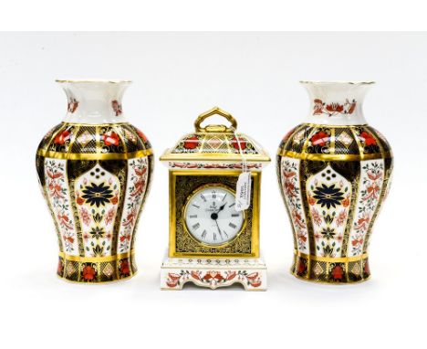 A pair of Royal Crown Derby, Old Imari 1128 pattern, vases together with a mantle clock (3)