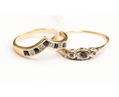 Two 9ct gold rings one wish bone style set with diamonds and sapphires, size N, along with another yellow metal ring (af) wit