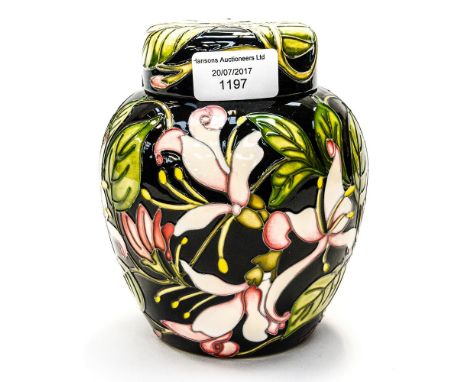  A Moorcroft ginger jar and cover signed by artist 2012 K Cunlin?, fushia pattern on black ground 