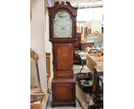 A 19th Century M. Ashton of Ashbourne crossbanded oak longcase clock, swan neck pediment, painted dial with shells in the arc