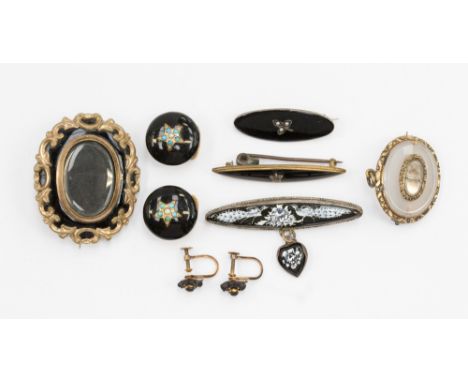 A 19th Century mourning jewellery to include pinchbeck brooch, moonstone and gilt metal brooch, turquoise and seed pearl in b