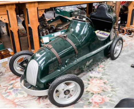 A circa 1949 Austin Pathfinder Special pedal car, British racing green livery with bonnet straps, pneumatic tyres, three whee