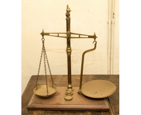 A pair of Victorian W and T Avery scales, brass and mahogany with stencilled name