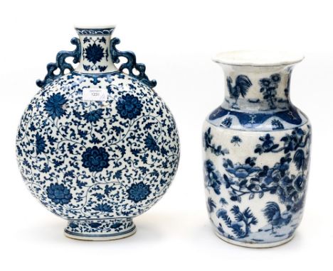 A Chinese blue and white moon flask, lotus flower and scroll design; together with shouldered vase (2) 