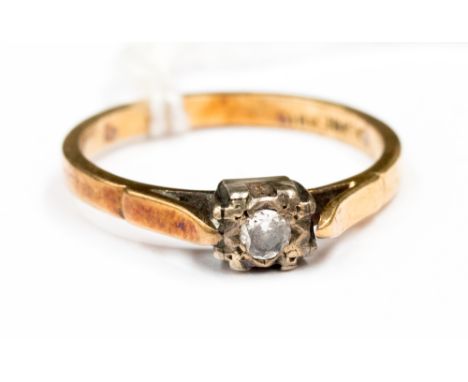 An 18ct gold diamond solitaire ring, with a fancy setting in white gold, size P, with a total gross weight approx 3gms