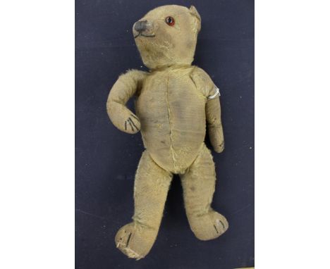 A Chiltern/Chad Valley Mohair teddy bear (late 1930s) has been well loved 