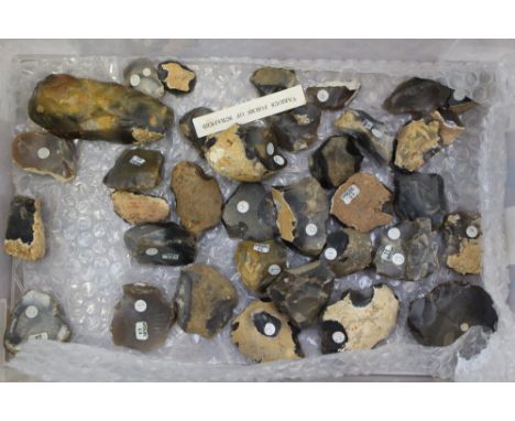 A collection of Neolithic Stone Age Flint tools to include an hand axe, blade cores and scrapers.