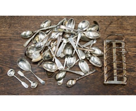 A Mappin and Webb silver plated toast rack, with a silver caddy spoon, two silver salt spoons and a collection of EPNS spoons