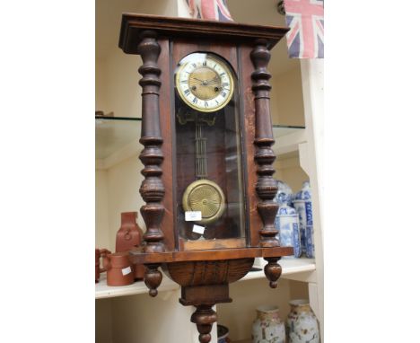 An early 20th Century wall clock; Eagle pediment 