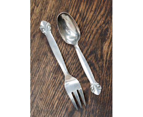 Gundorph Albertus for Georg Jensen, a Danish silver Cactus variant pattern spoon and fork set, designed circa 1930, 16cm and 