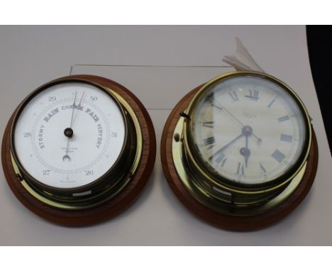 A Smiths Astral Ships wall clock, together with a wall barometer by Short and Mason, London, both oak framed 