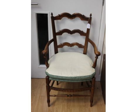 A pair of early 20th Century ladder back chairs (2)