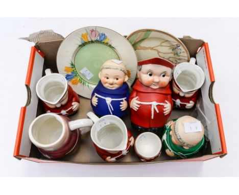 A collection of blue, green and red Goebel monk figures as jugs and money boxes 