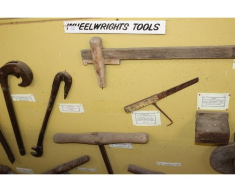A large display board of Vintage Rural Bygone Wheelwrights Tools to include over fifteen items. Marking tools, compass, spann