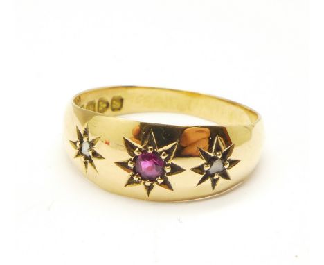 An 18ct gold, ruby and diamond gypsy ring, Chester 1924, 3.7g, P 