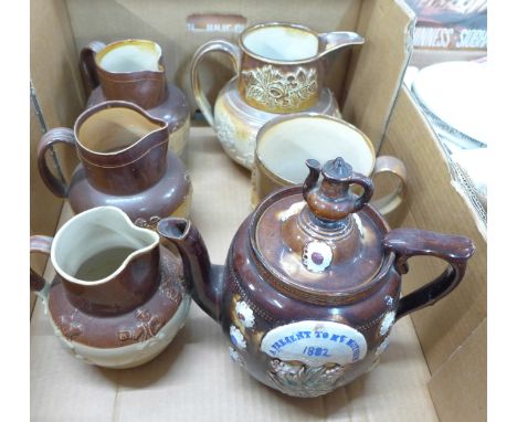 Doulton Lambeth and other salt glaze relief moulded jugs with farming and tavern scenes, a relief mould mug and a bargeware t