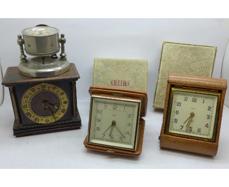 Two Smiths travel clocks, boxed, one other clock and an alarm clock 