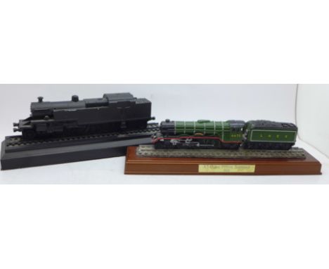 A Lilliput Lane model Flying Scotsman and a carved coal model railway engine 