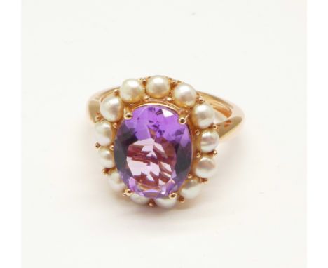 A silver gilt, amethyst and pearl cluster ring, O 