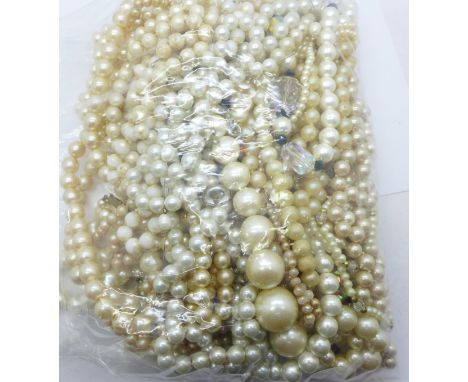 A collection of faux pearl necklaces 