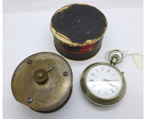 An alarm clock marked Penn, A. Paris, and a double sided pocket watch 