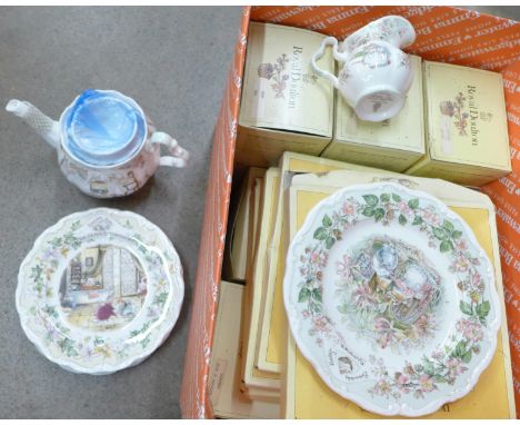 A collection of Royal Doulton Brambly Hedge china; teapot, four cups and saucers, four beakers, cream and sugar, four seasons