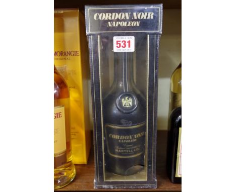 A bottle of Martell Cordon Noir Napoleon cognac, early 1980s bottling, in card box.wine 