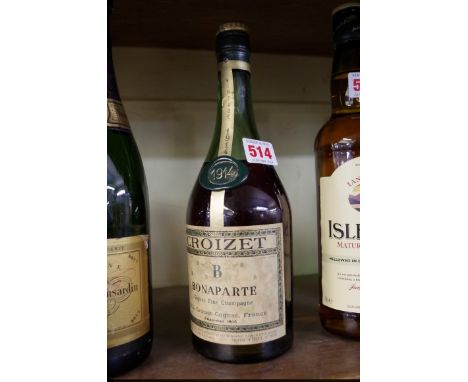 A bottle of Croizet 1914 vintage fine champagne cognac. 