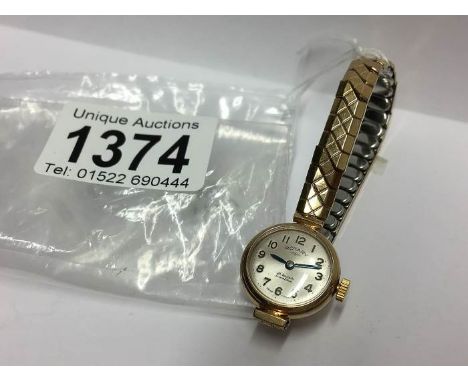A Rotary 21 jewel ladies wrist watch on a rolled gold bracelet