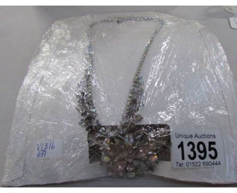A vintage diamonte necklace and bangle